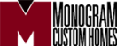 Logo for Monogram Custom Homes, featuring a large red M with a black triangle at the top center, next to the company name in black, all-caps text.